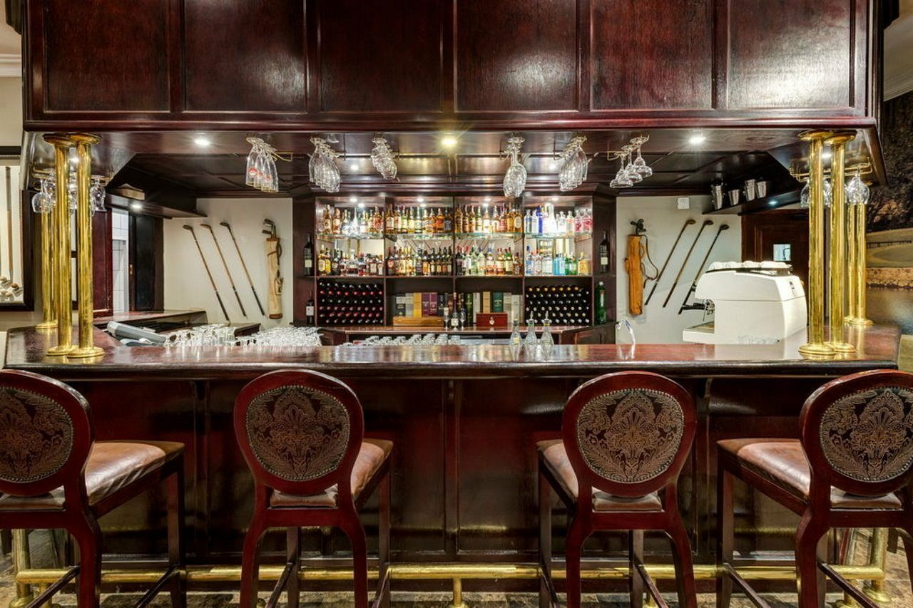 Irene Country Lodge, Autograph Collection Centurion Exterior photo The bar at the American Bar
